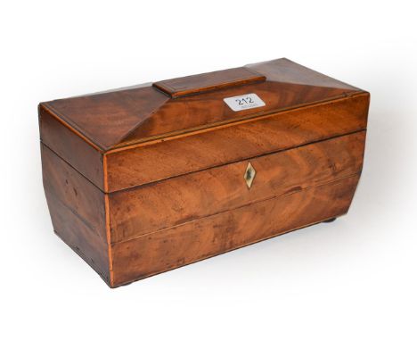 A George III mahogany tea caddy with box wood link inlay and satinwood inlay with two lidded tea boxes and a mixing bowl 