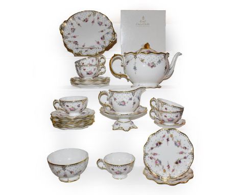 A Royal Crown Derby Royal Antoinette pattern six place teaset, including a boxed small comport (first quality) (two trays).  