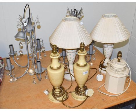 Two pairs of modern table lamps together with a single table lamp and a pair of five light ceiling lights