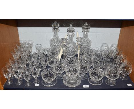 A mixed suite of crystal drinking glasses etc, to include three decanters, Waterford brandy glasses, whisky tumblers and Roya