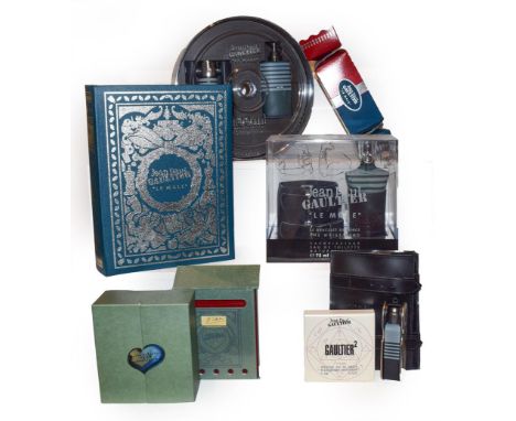Four Jean Paul Gaultier perfumes including Le Male 75ml eau de toilette boxed with a black leatherette cuff, another in a cir
