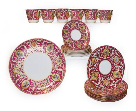 Royal Worcester tea wares decorated with vignettes of birds on a gilt highlighted pink ground comprising six tea cups, six sa