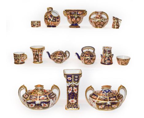 Fifteen Royal Crown Derby Imari items comprising a pair of covered twin-handled vases, two miniature teapots, miniature milk 