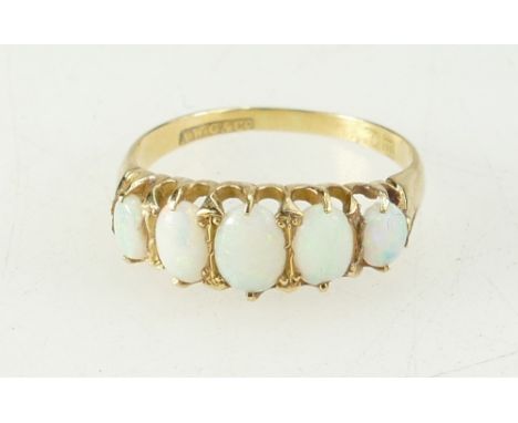 18ct gold five stone opal ring, 2.6 grams, in original Pidducks & sons box, size Q 