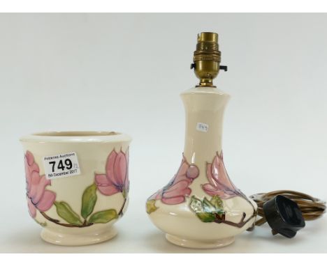 A Moorcroft lamp base and matching jar. (2)