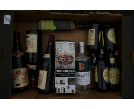 A mixed collection of alcoholic beverages to include Chivas Regal Blended Scotch Whisky, Brooks Dry Gin, Brookies Dry Gin, bo