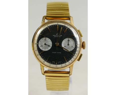 Breitling 1960's Top Time Gold-Plated and Stainless Steel Chronograph Ref 2033. Dial -two-color, gold and black with faceted 