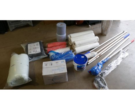 A mixed collection of cleaning products to include mops and cleaning poles, industrial vacuum waste bags, table clothes, powd