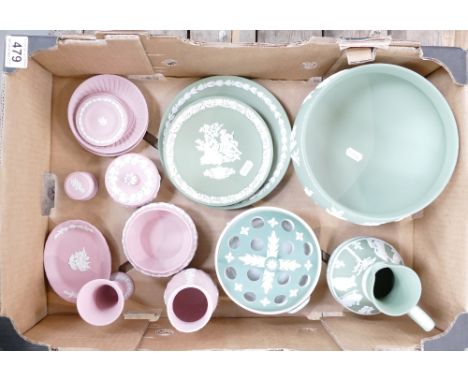 A collection of Wedgwood Jasper Ware items in the sage green, pink colour ways to include vases, salad bowls, dishes, trinket