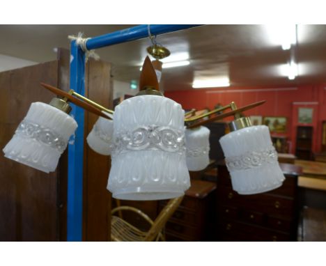 A teak ceiling light