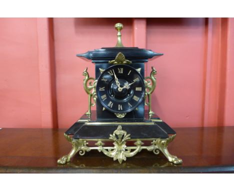 A 19th Century French Belge noir and ormolu mounted mantel clock, the movement signed Japy Freres
