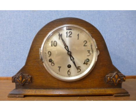 An early 20th Century oak Whittington chime mantel clock