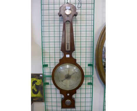 A Victorian mahogany wheel barometer