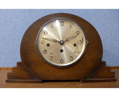 An early 20th Century oak Whittington chime mantel clock