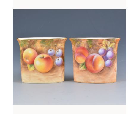 A Royal Worcester oval spill vase, date mark for 1960, painted with fruit, signed Roberts, 6.5cm, and another very similar, l