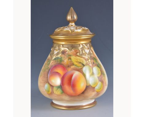 A Royal Worcester pot pourri vase and cover, shape H291, date mark for 1962, painted with fruit, signed Roberts, 13cm.