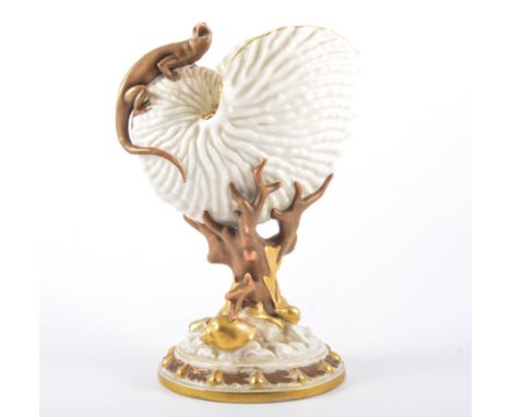 A Worcester posy vase, modelled as a conch shell and lizard, painted and highlighted in gilt, printed and impressed marks, he