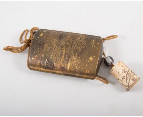 A five section lacquered maki-e Inro, late Edo period, with  landscape of lake, buildings and bridge, with bone netsuke, and 