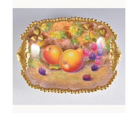 A Royal Worcester rectangular dish, shaped rim with twin scrolled handles, painted with fruit by Christopher Bowem, signed, 1