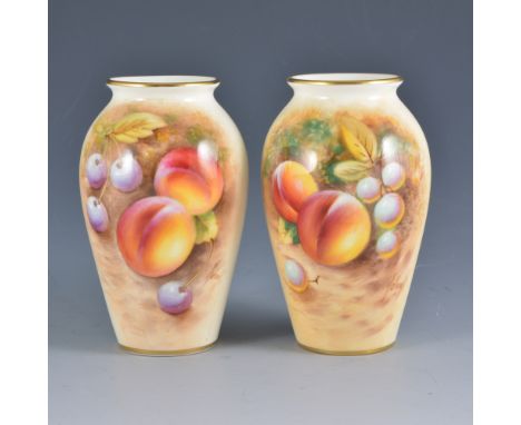 A pair of Royal Worcester vases, shape G461, painted with fruit, signed Roberts, 7cm, (2).