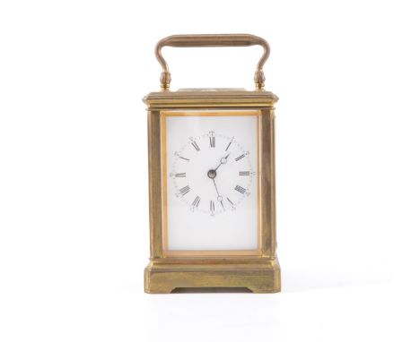 French brass cased carriage clock, white enamelled dial, platform escapement, striking on a gong, 14cm.