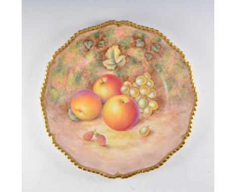 A Royal Worcester plate, wavy rim, painted number C55, painted with fuit by Harry Ayrton, signed, diameter 27cm.