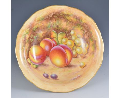 A Royal Worcester bowl, wavy rim, plain foot, painted with fruit by Richard Lewis, signed, diameter 23.5cm.