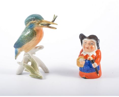 A small Royal Worcester Mrs Toby jug, 2841, 9cm and a Karl Ens model kingfisher, 13cm, (2).