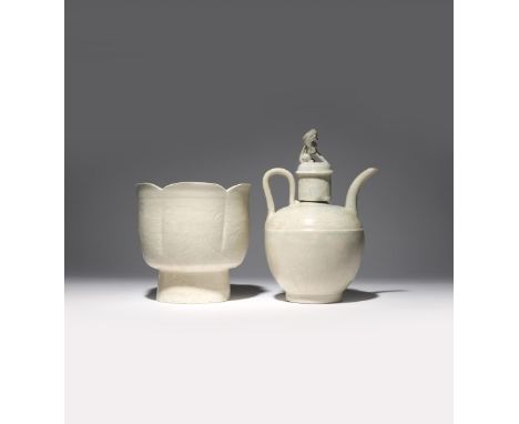 A CHINESE QINGBAI EWER, COVER AND BASIN SONG DYNASTY The ewer with an ovoid body surmounted by a cylindrical neck, carved wit