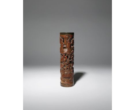 A CHINESE CARVED BAMBOO INCENSE HOLDER 18TH/19TH CENTURY The cylindrical body carved in relief and pierced with scholars, att