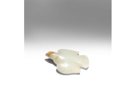 A CHINESE WHITE JADE 'EAGLE' PENDANT QING DYNASTY OR LATER The bird of prey carved with its wings spread and its legs tucked 