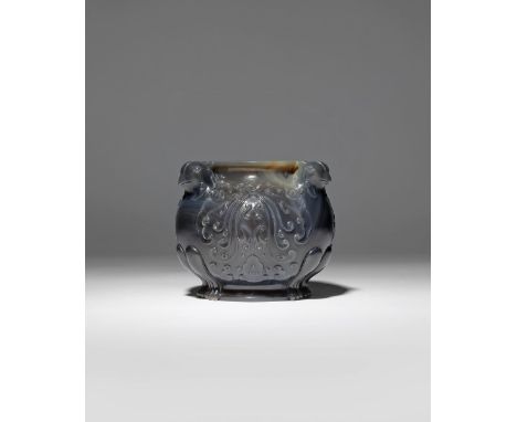 A SMALL CHINESE IMPERIAL AGATE 'HEAVENLY DOVE' VASE FOUR CHARACTER QIANLONG MARK AND OF THE PERIOD 1736-95 The stout body rai