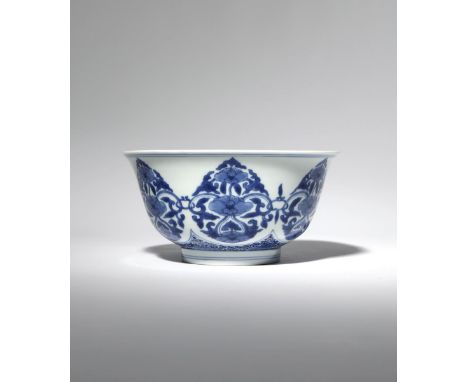 A CHINESE BLUE AND WHITE 'PEONY' BOWL SIX CHARACTER KANGXI MARK AND OF THE PERIOD 1662-1722 The U-shaped body rising from a g