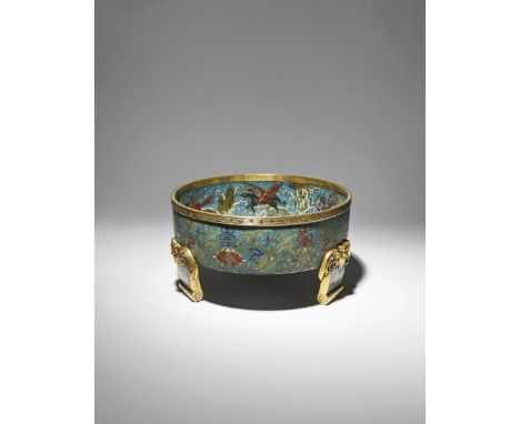 *A LARGE CHINESE CLOISONNE CIRCULAR BASIN QIANLONG 1736-95 With shou characters above lotus blooms amongst stylised leaves to