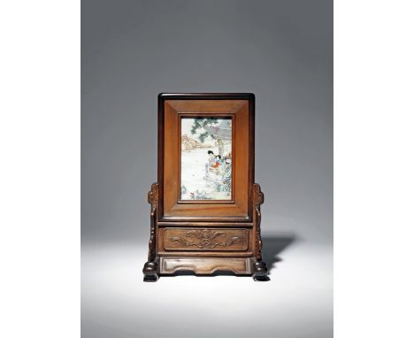 A CHINESE FAMILLE ROSE TABLE SCREEN REPUBLIC PERIOD Painted with a scene of two ladies gazing at swallows in flight from a la