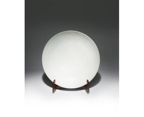 A MASSIVE CHINESE IMPERIAL WHITE GLAZED ANHUA-DECORATED 'LOTUS' DISH SIX CHARACTER KANGXI MARK AND OF THE PERIOD 1662-1722 Th