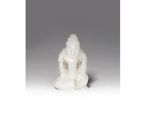 A MINIATURE CHINESE WHITE JADE CARVING OF A FOREIGNER SONG/YUAN DYNASTY The northern nomad (huren) depicted seated with his l