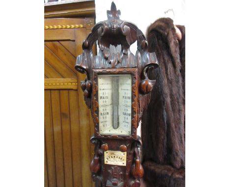 19th Century carved oak stick barometer, the ivory scales with twin adjustable vernier, signed Cain, Halifax, the ornate roco