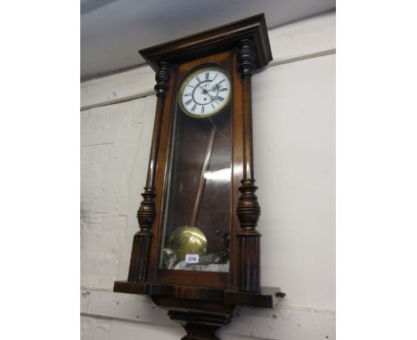 Large 19th Century Continental walnut cased Vienna type wall clock, the enamel dial with Roman numerals, subsidiary seconds a