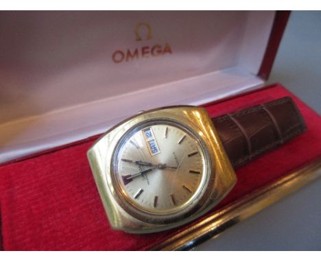 Gentleman's Omega Megaquartz 32KHZ gold plated wristwatch with date aperture on a brown leather strap with original box