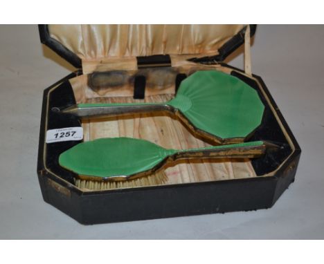 Silver and green translucent enamel hand mirror with hairbrush