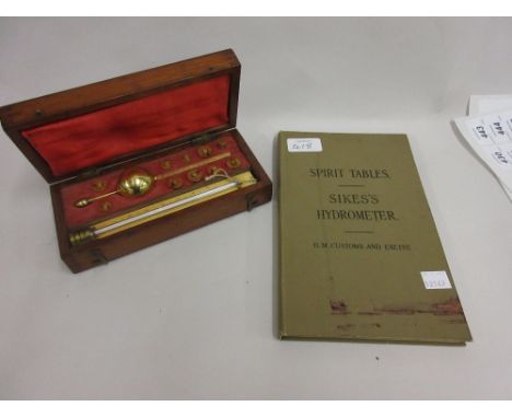 19th Century mahogany cased Sikes hydrometer together with an accompanying Customs and Excise book