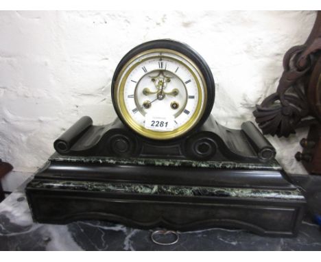 19th Century black slate and green flecked marble two train mantel clock, the white enamel dial with Roman numerals and visib
