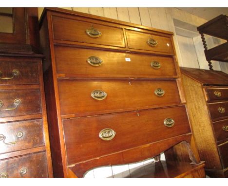 19th Century mahogany straight front chest of two short and three long graduated drawers with oval brass handles, raised on b