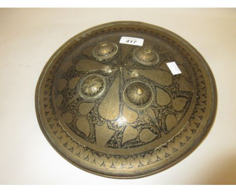 Small Persian brass shield with engraved and black enamel decoration