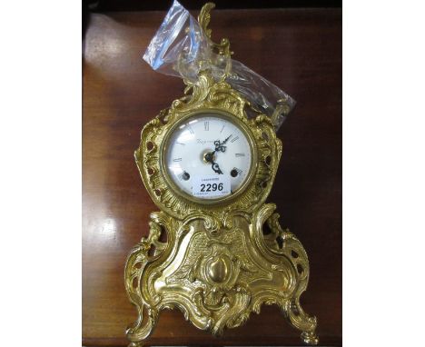 Reproduction French gilt metal two train mantel clock 