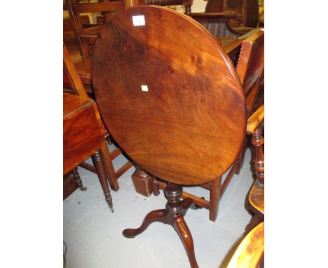 George III circular mahogany tilt-top tripod table