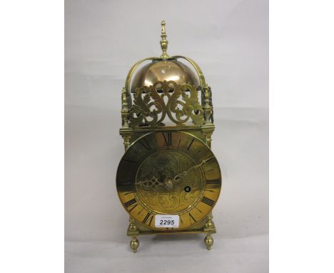 19th Century brass lantern clock, the engraved dial with Roman numerals and single train movement