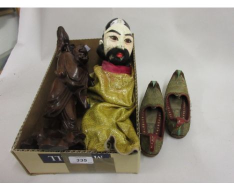 Far Eastern carved and painted puppet with fabric dress together with a pair of Middle Eastern gold thread slippers and a Chi