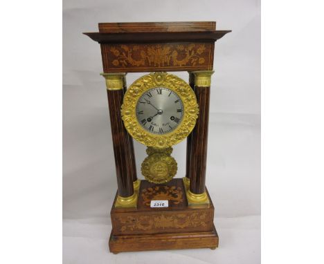 19th Century French rosewood, marquetry inlaid and ormolu mounted portico clock, the silvered dial with Roman numerals, signe